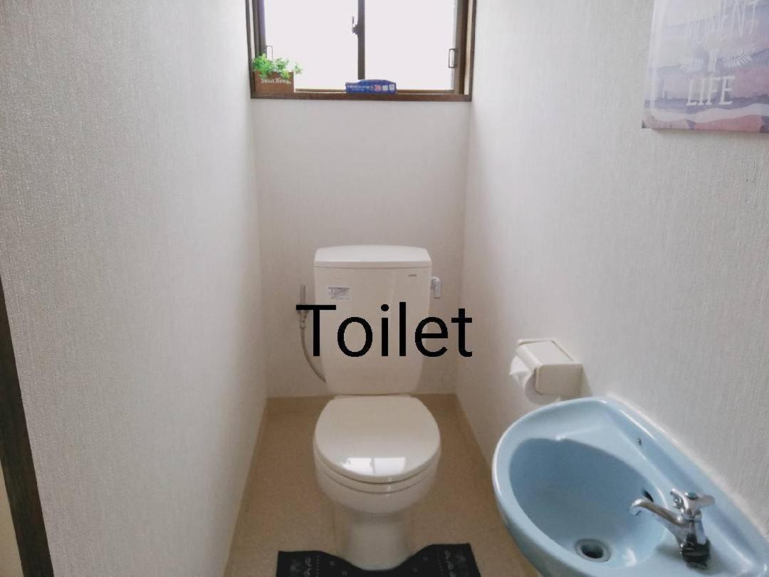 Kakazu Cottage Motobu Bagian luar foto